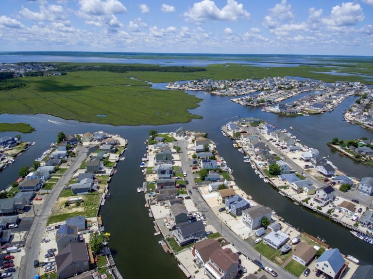 Expansive aerial view of Little Egg Harbor Township, NJ showcasing residential canals and coastline.